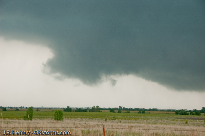 Low hanging wall cloud northeast of Hennessy, OK.