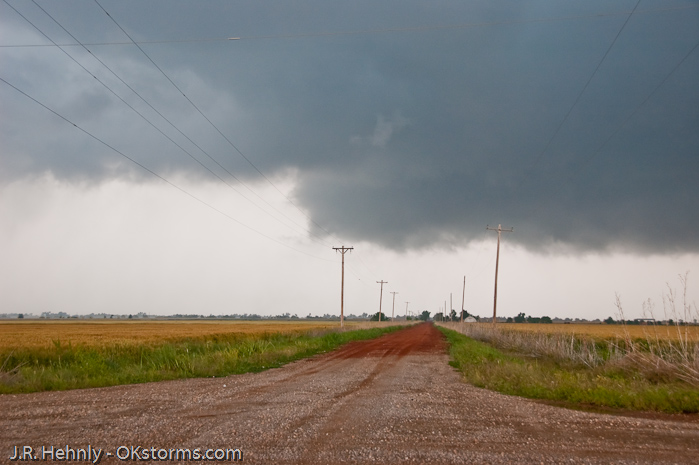 Low hanging wall cloud northeast of Hennessy, OK.