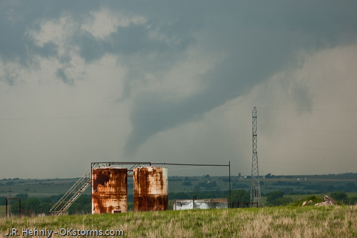 Simultaneous tornadoes continue on the ground for several minutes near Orlando, OK.