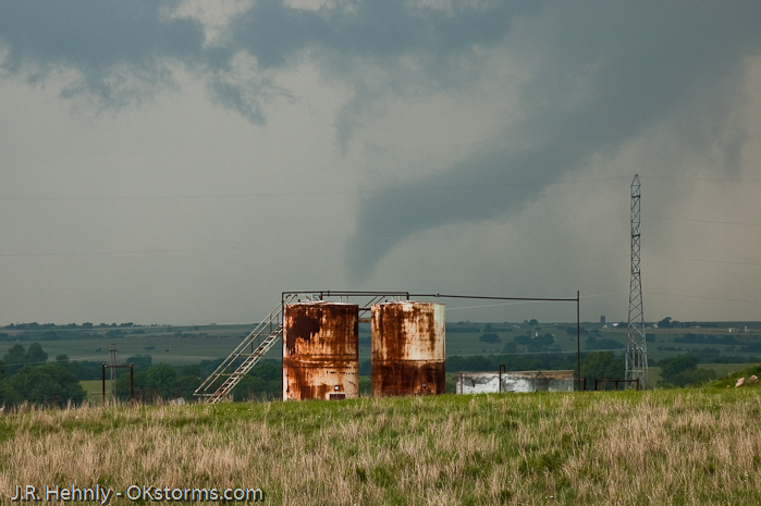Simultaneous tornadoes continue on the ground for several minutes near Orlando, OK.