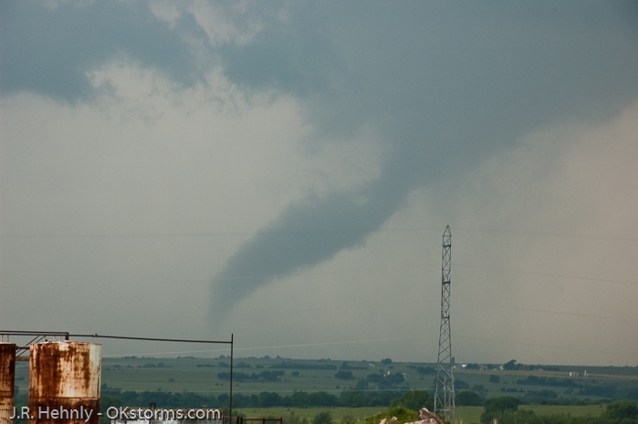 Simultaneous tornadoes continue on the ground for several minutes near Orlando, OK.