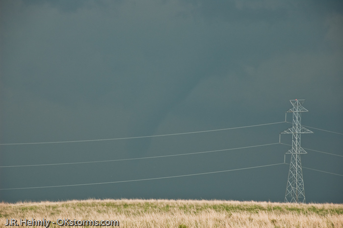 Simultaneous tornadoes continue on the ground for several minutes near Orlando, OK.