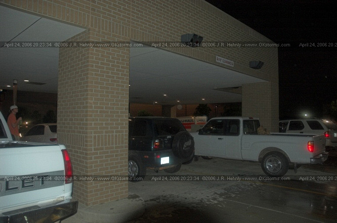 April 24, 2006 - North and Central Oklahoma, El Reno Tornado Yukon - Cars scramble to find space under the bank drive-thru as quarter size hail falls.
 - 20060424_202334.jpg