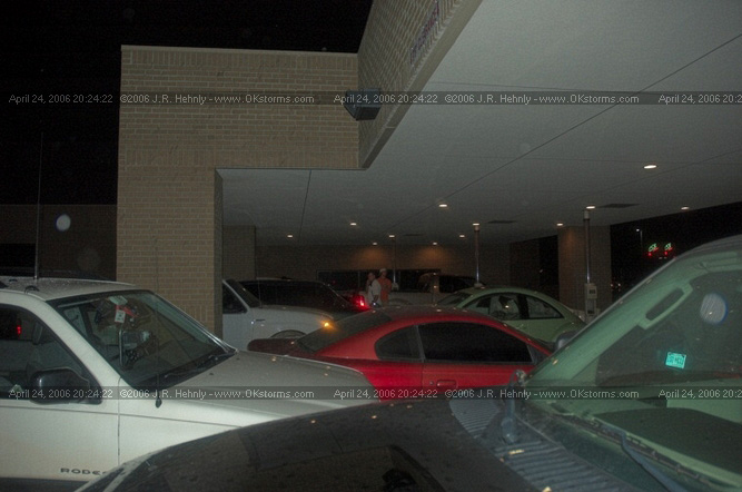 April 24, 2006 - North and Central Oklahoma, El Reno Tornado Yukon - Cars scramble to find space under the bank drive-thru as quarter size hail falls.
 - 20060424_202422.jpg