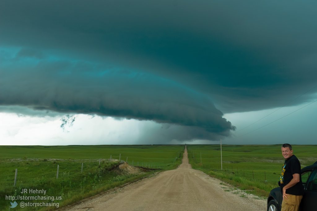 Verne Carlson preparing to leave as the storm approaches - 6/19/2011 4:13:35 PM - Potter, Nebraska - USA - 