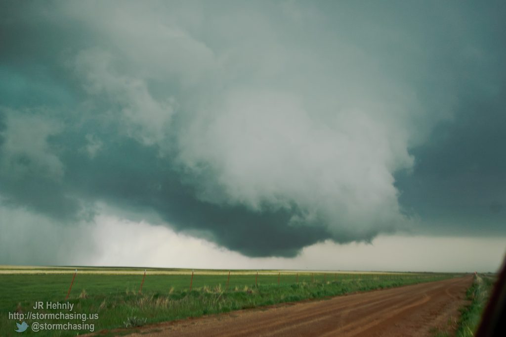Storm is tornado warned as it wrapps up and produces intermittent vorticies beneath a rapidly rotating wall cloud - 4/17/2013 4:35:06 PM - Frederick, Oklahoma - USA - 