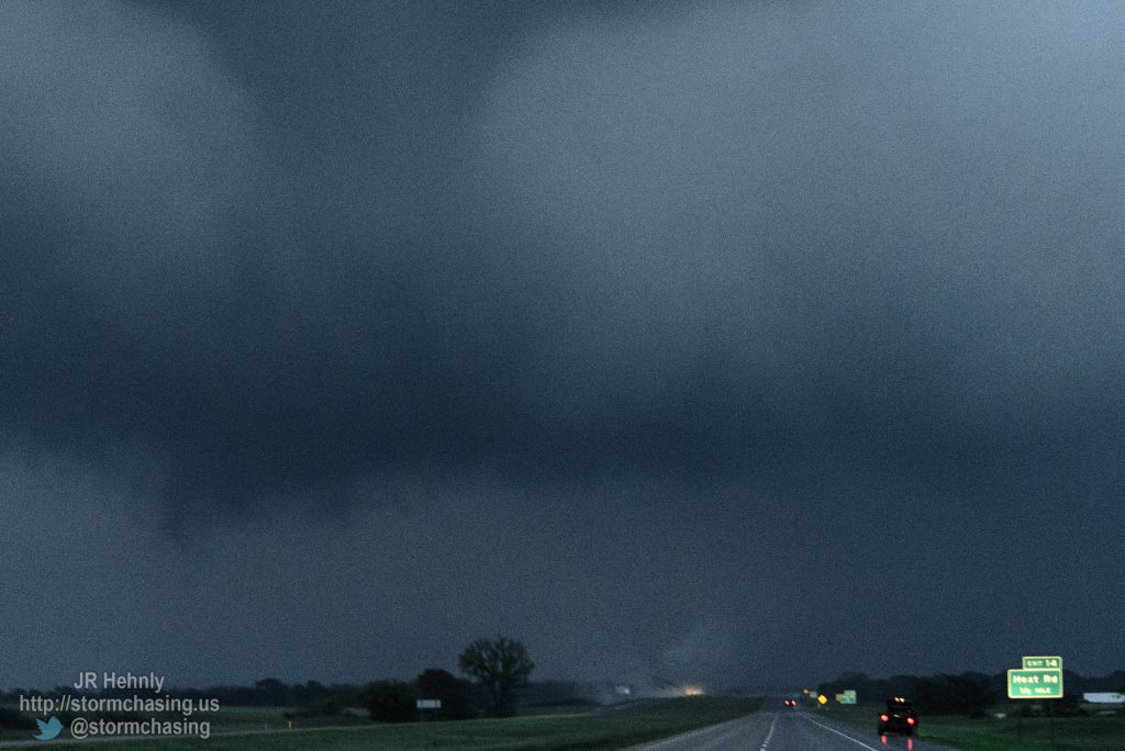 As I approach I see debris being lofted into the air as the tornado crosses I-40 a few hundred yards in front of me. - 4/16/2015 8:09:21 PM - Interstate 40 - Erick, Oklahoma - 