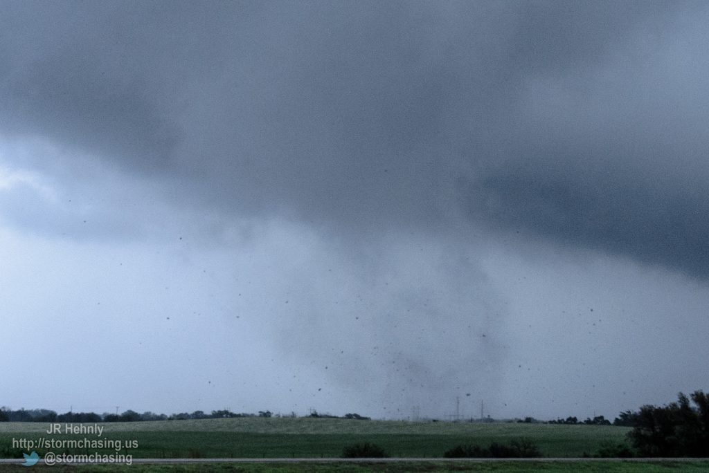 I pulled over and got out to watch as the tornado moved through the field just north of me. There was hardly any wind where I was, and the sound of the tornado was very apparent. It sounded like a waterfall. - 4/16/2015 8:10:20 PM - Interstate 40 - Erick, Oklahoma - 