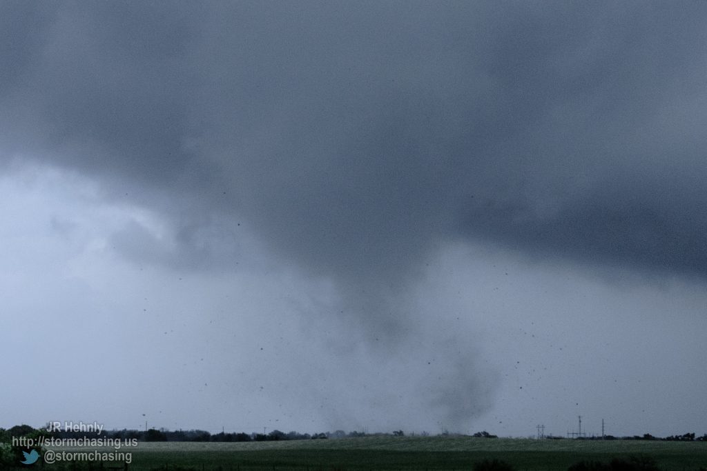 I pulled over and got out to watch as the tornado moved through the field just north of me. There was hardly any wind where I was, and the sound of the tornado was very apparent. It sounded like a waterfall. - 4/16/2015 8:10:28 PM - Interstate 40 - Erick, Oklahoma - 
