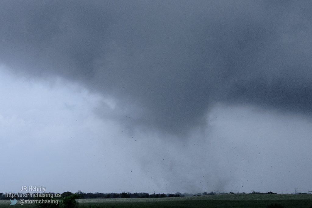 I pulled over and got out to watch as the tornado moved through the field just north of me. There was hardly any wind where I was, and the sound of the tornado was very apparent. It sounded like a waterfall. - 4/16/2015 8:10:33 PM - Interstate 40 - Erick, Oklahoma - 