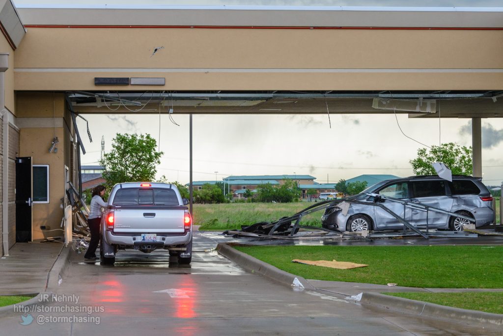 Part of the drive-through at Arvest bank was torn off and damaged vehicles taking refuge there. - 5/6/2015 6:40:13 PM - West Tecumseh Road - Norman, Oklahoma - 