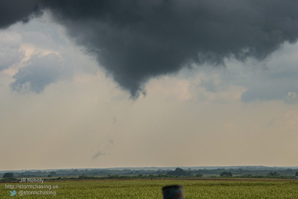 I am pretty confident that the circulation under the wall cloud briefly touches the ground here, the first tornado of the day. - 5/11/2023 5:23:12 PM - Oklahoma 5B - Walters, Oklahoma - 